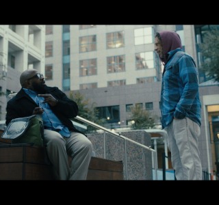 color-grading-men-in-front-of-municipal-building